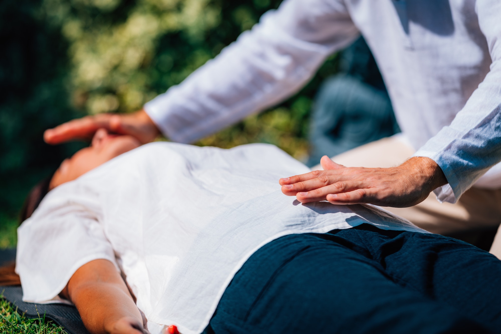 Close-up of a Relaxed Woman Having Reiki Healing Treatment